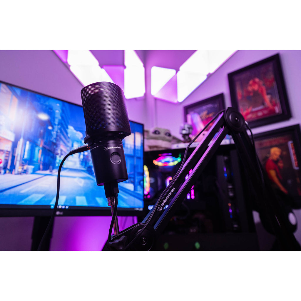 Audio Technica AT8175 microphone pop filter attached to a microphone, reducing unwanted noise during vocal recording.