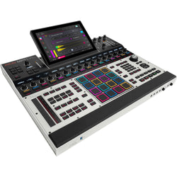 Akai Professional MPC XL drum machine and sampler with large pads, control knobs, and a display screen for music production.