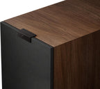KEF Q6 Meta center speaker showing sleek black design with drivers and grille for home theater audio setup.