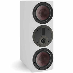 DALI Rubikore Cinema center speaker in high-gloss white, showcasing sleek design and speaker grille for home theater audio.