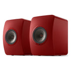 KEF LS50 Wireless II wireless speakers showing sleek black cabinets and modern design with speaker grilles.