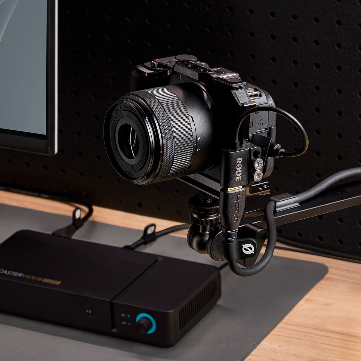 Rode HDMI Adaptor connecting a mirrorless camera to a RODECaster Video on a desk